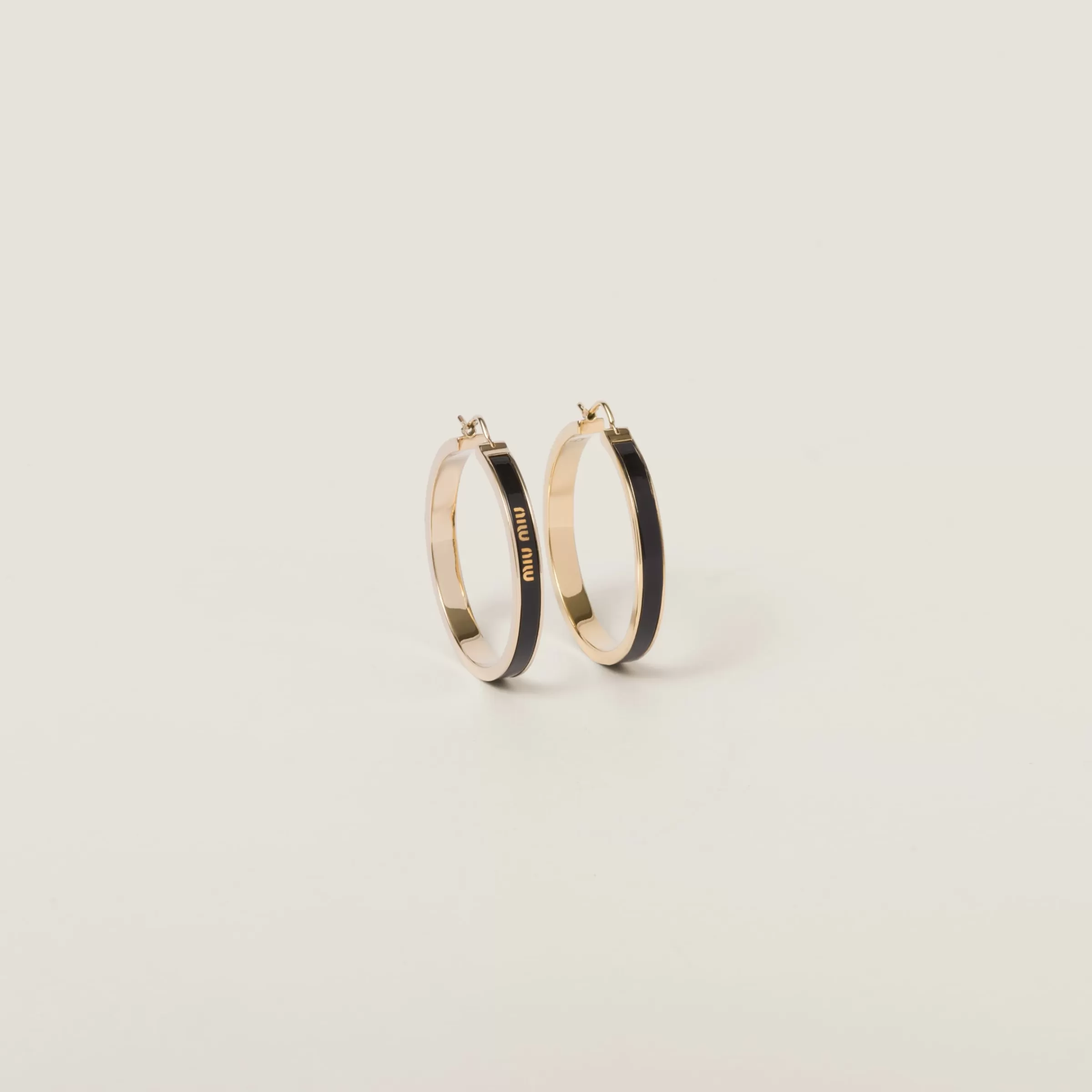 Miu Miu Enameled Metal Earrings |