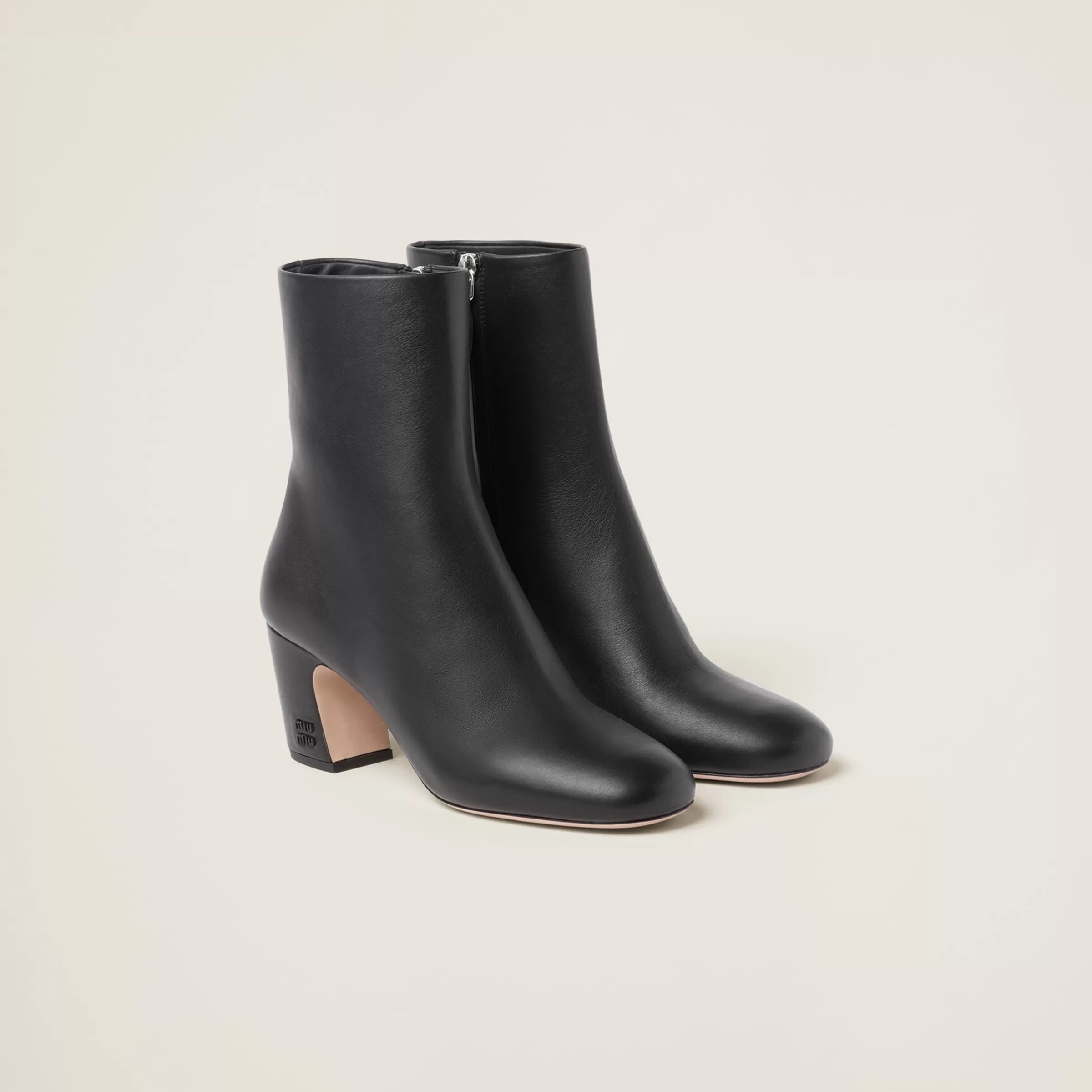 Miu Miu Leather Booties |