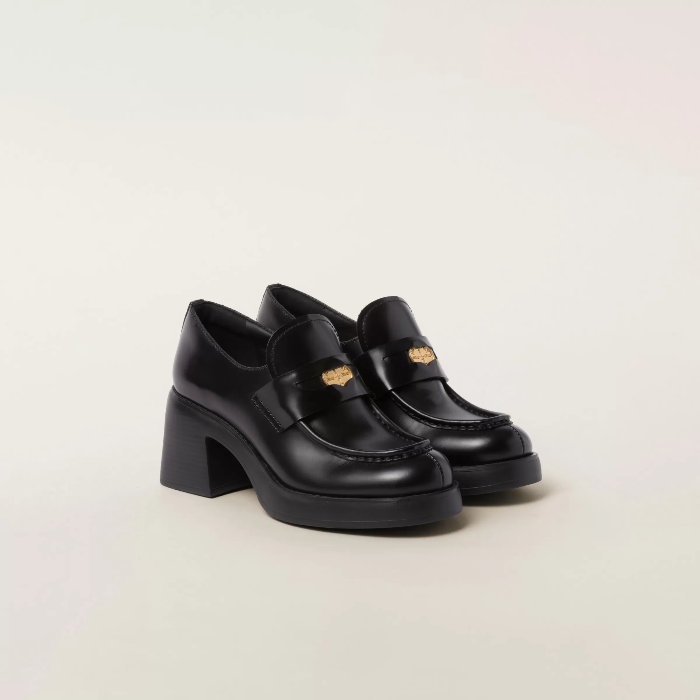 Miu Miu Leather Penny Loafers |