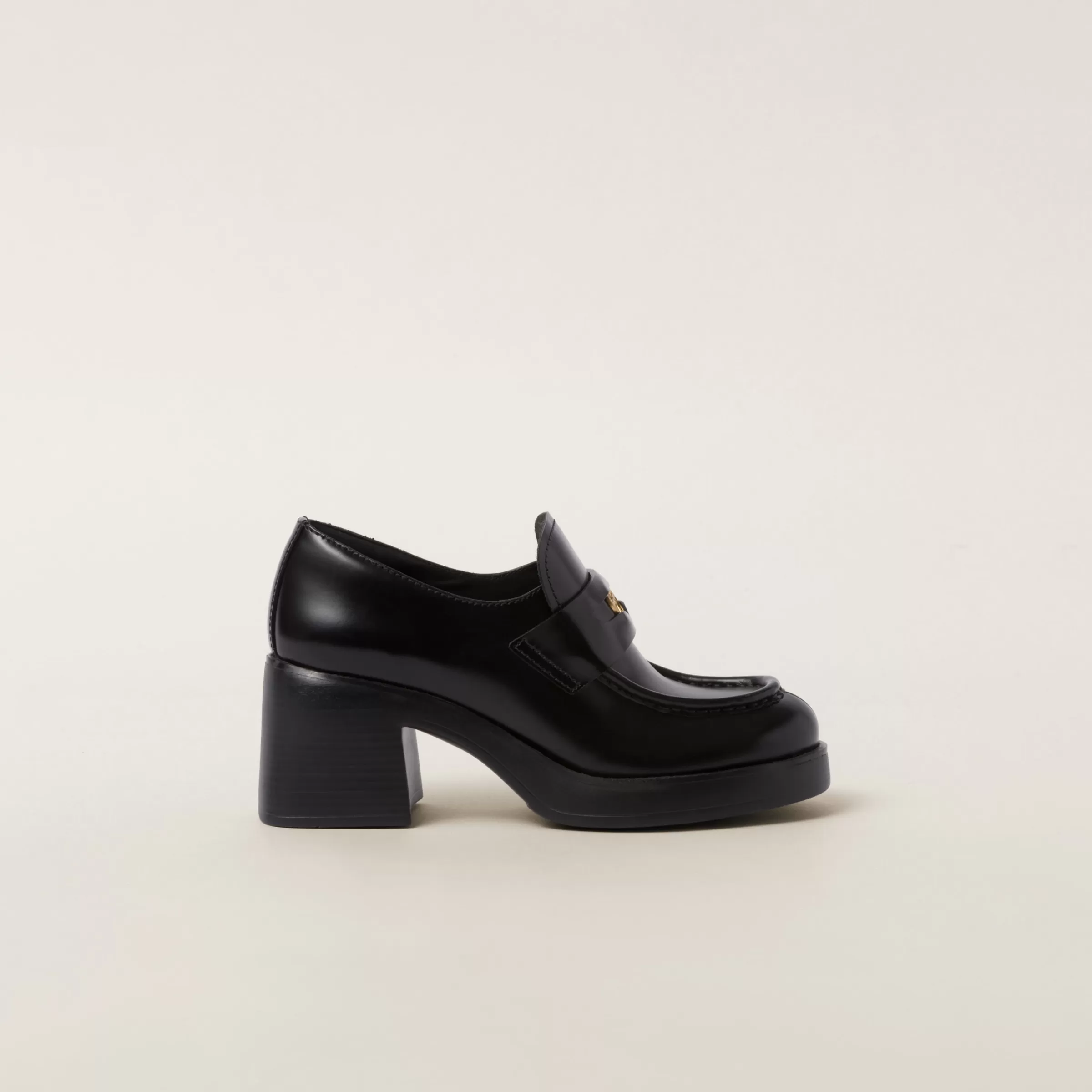 Miu Miu Leather Penny Loafers |