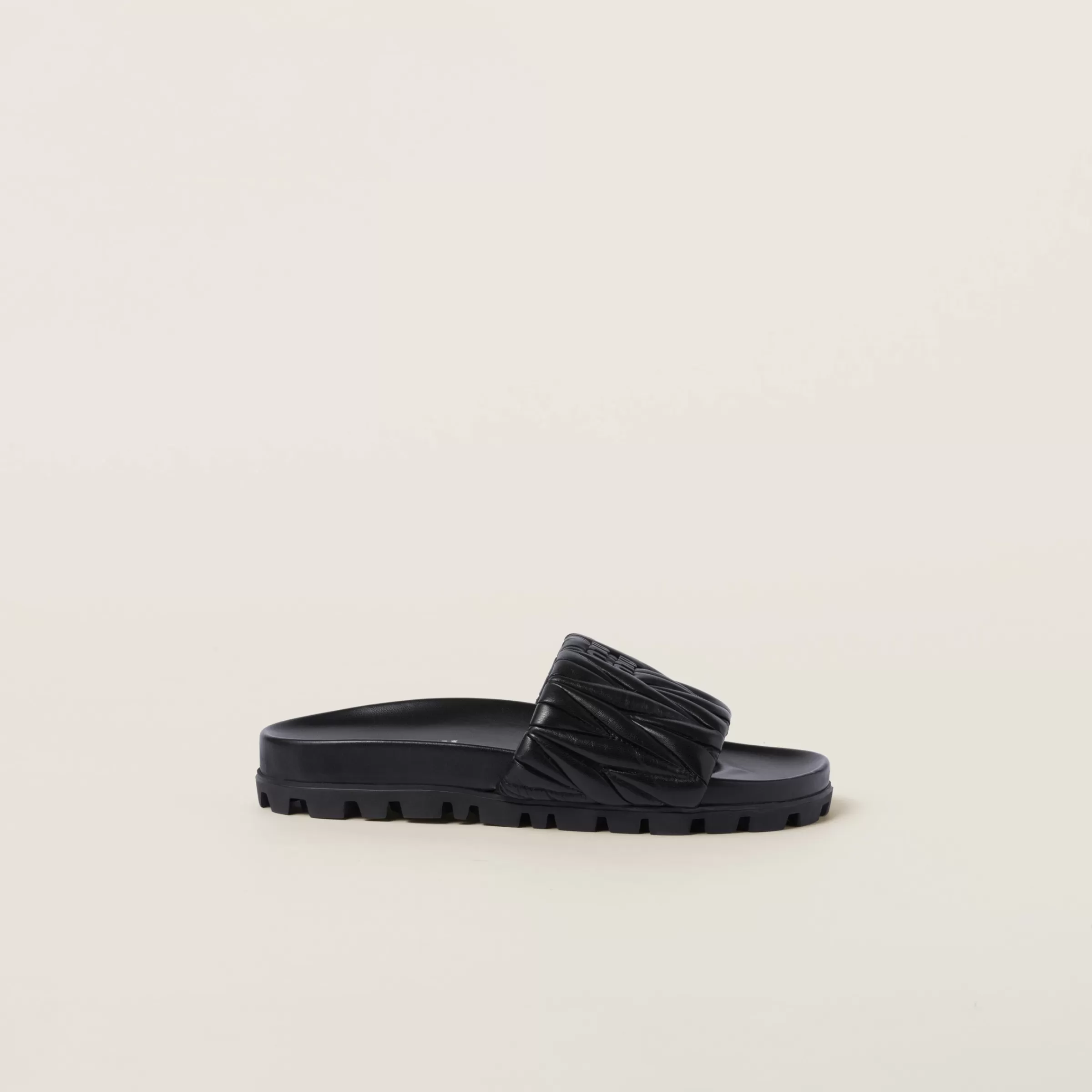 Miu Miu Matelassé Nappa Leather Slides |