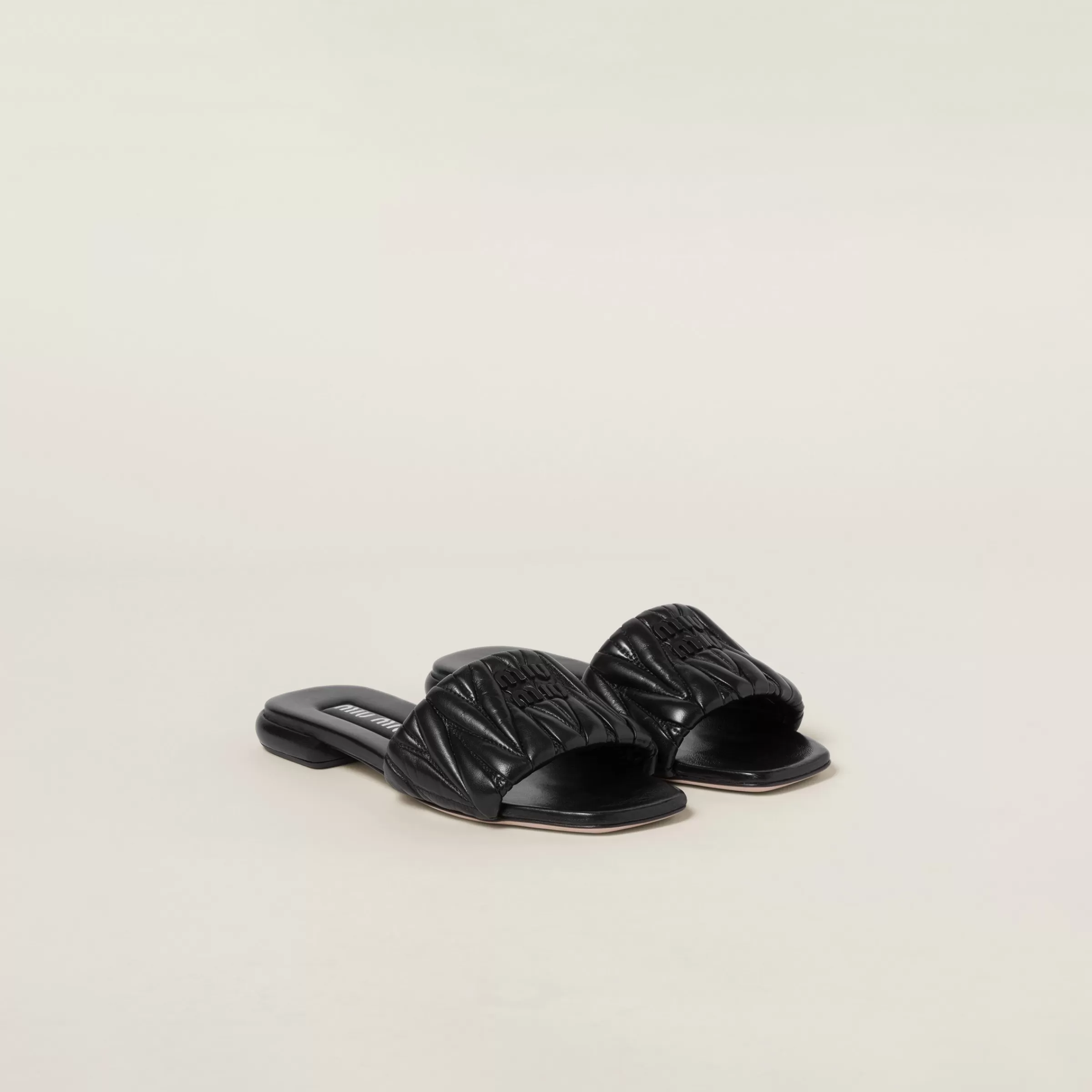 Miu Miu Matelassé Nappa Leather Slides |