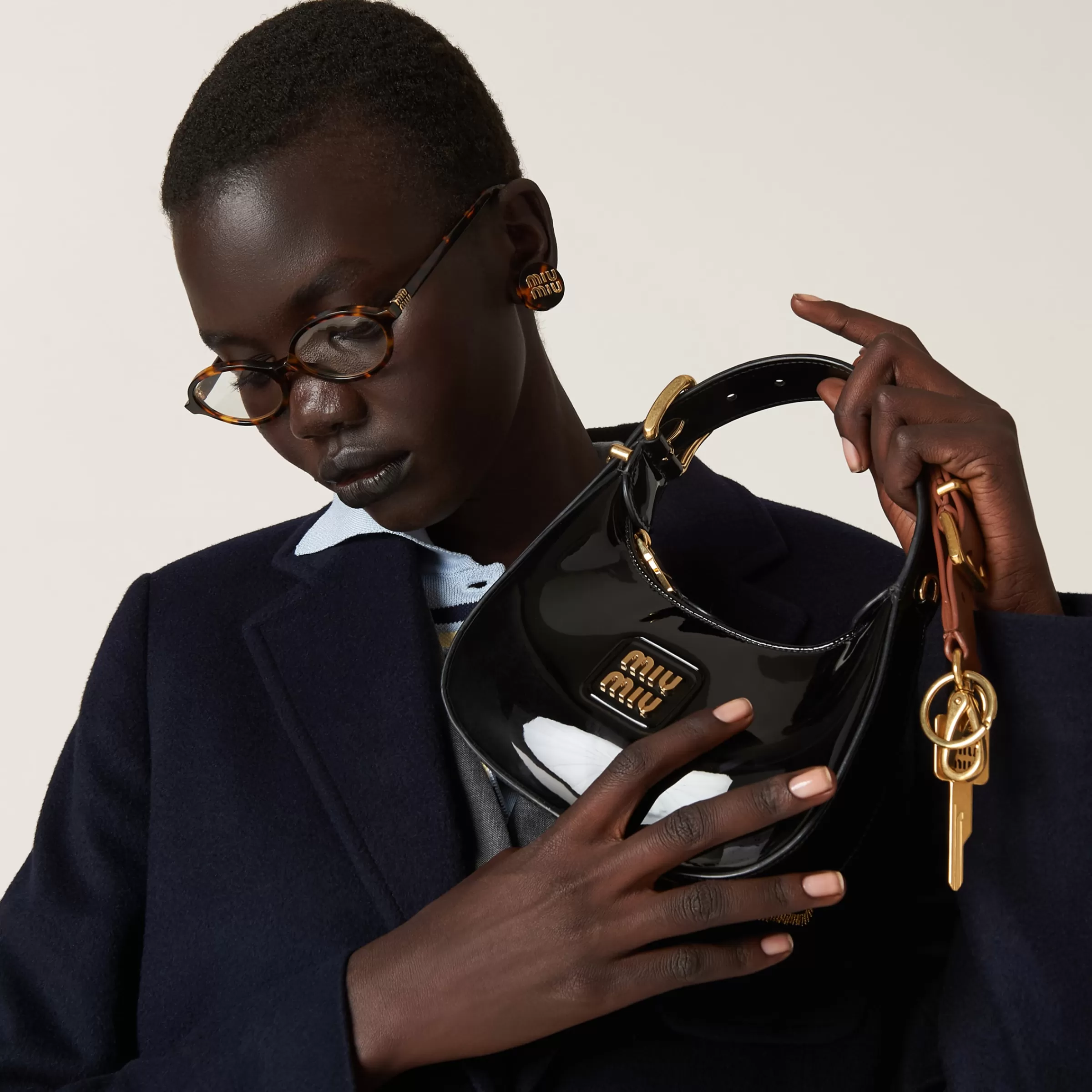 Miu Miu Patent Leather Hobo Bag |