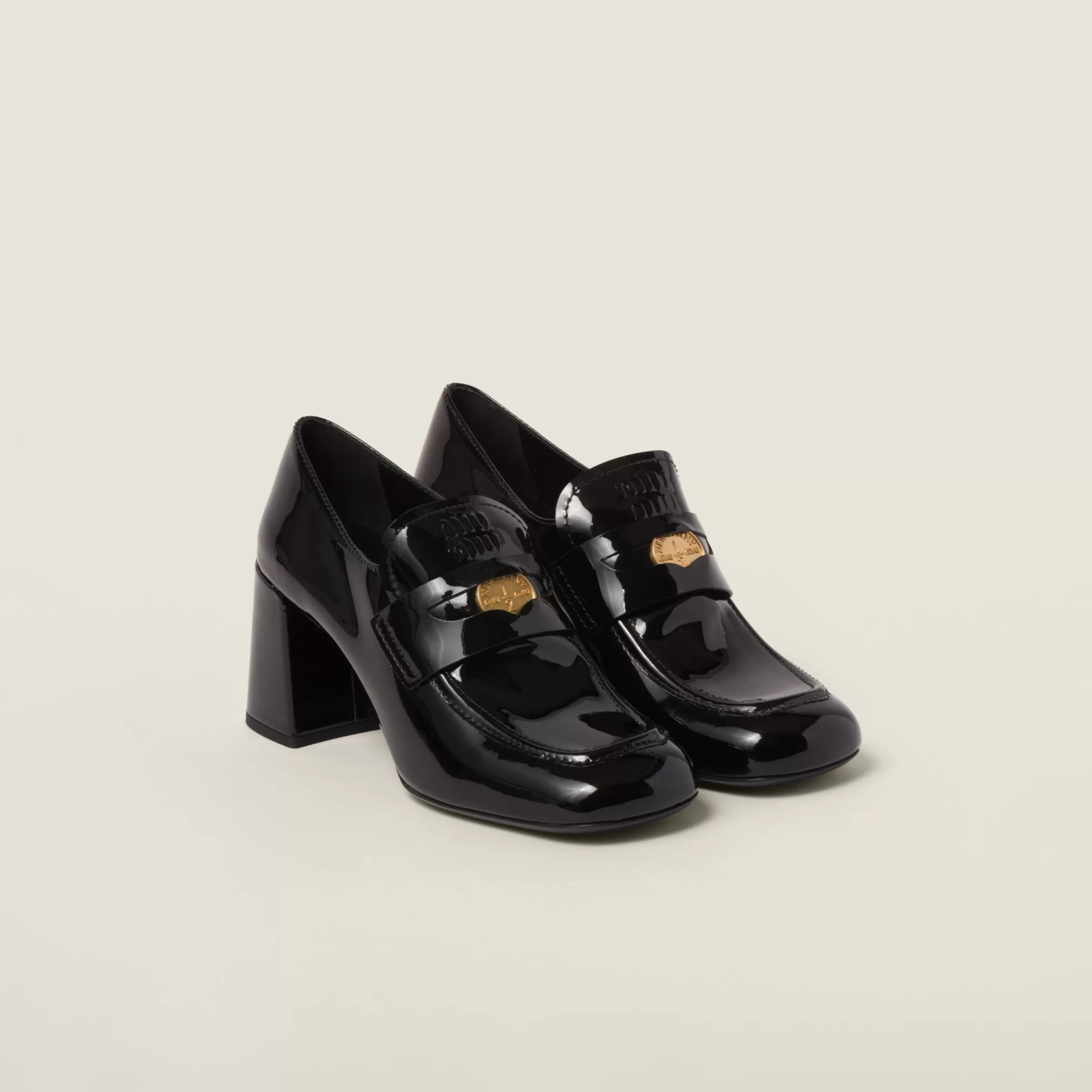 Miu Miu Patent Leather Loafers |