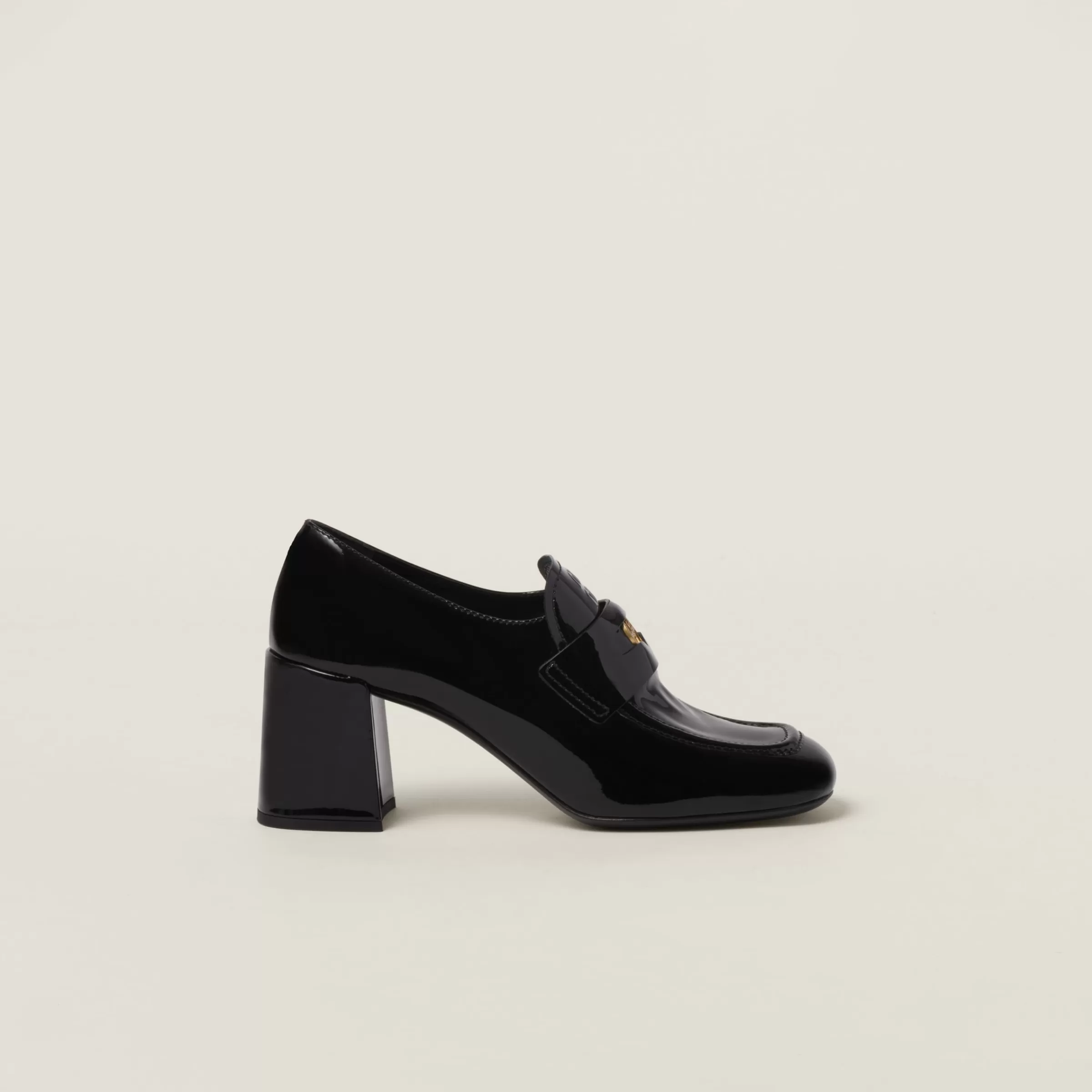 Miu Miu Patent Leather Loafers |