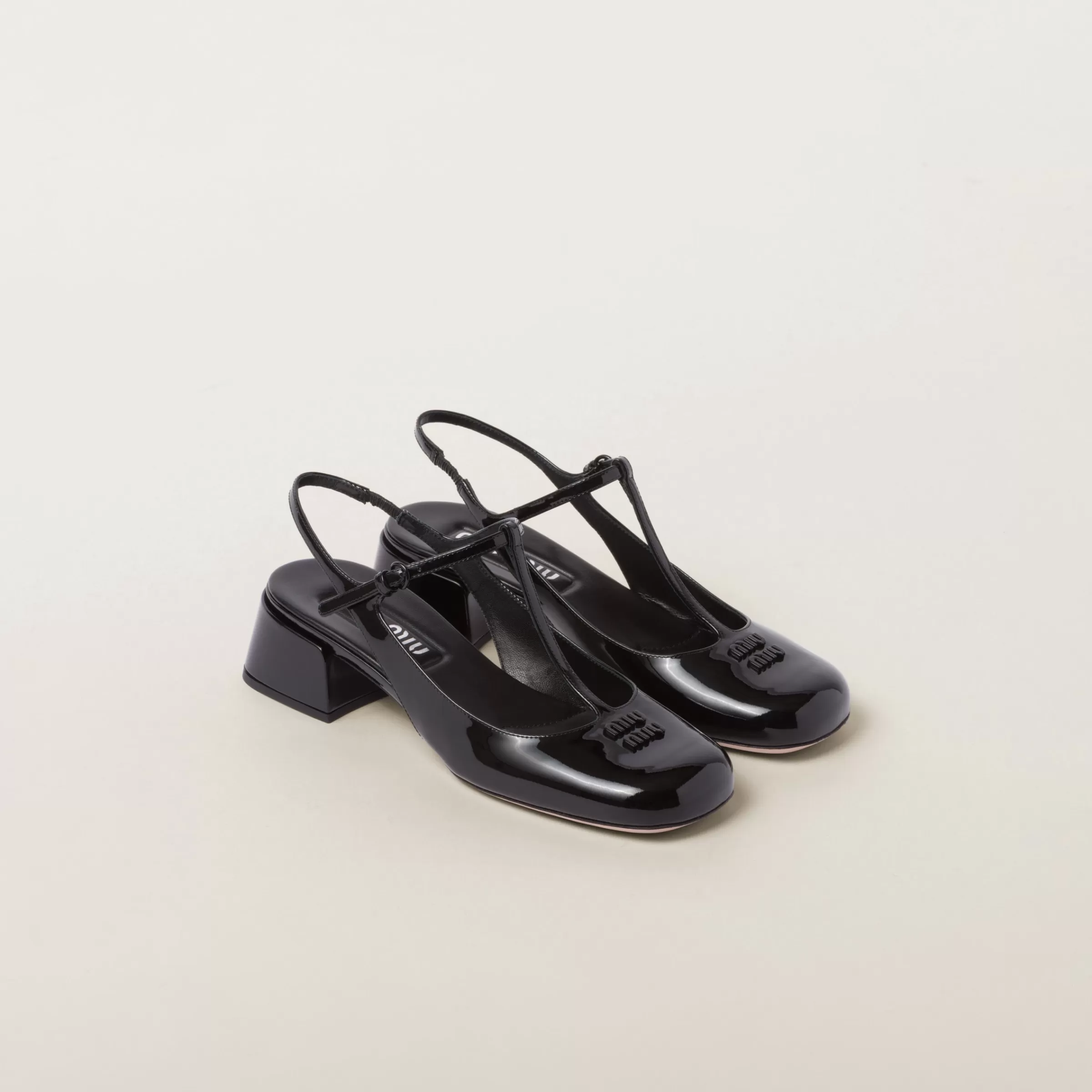 Miu Miu Patent Leather Slingback Pumps |