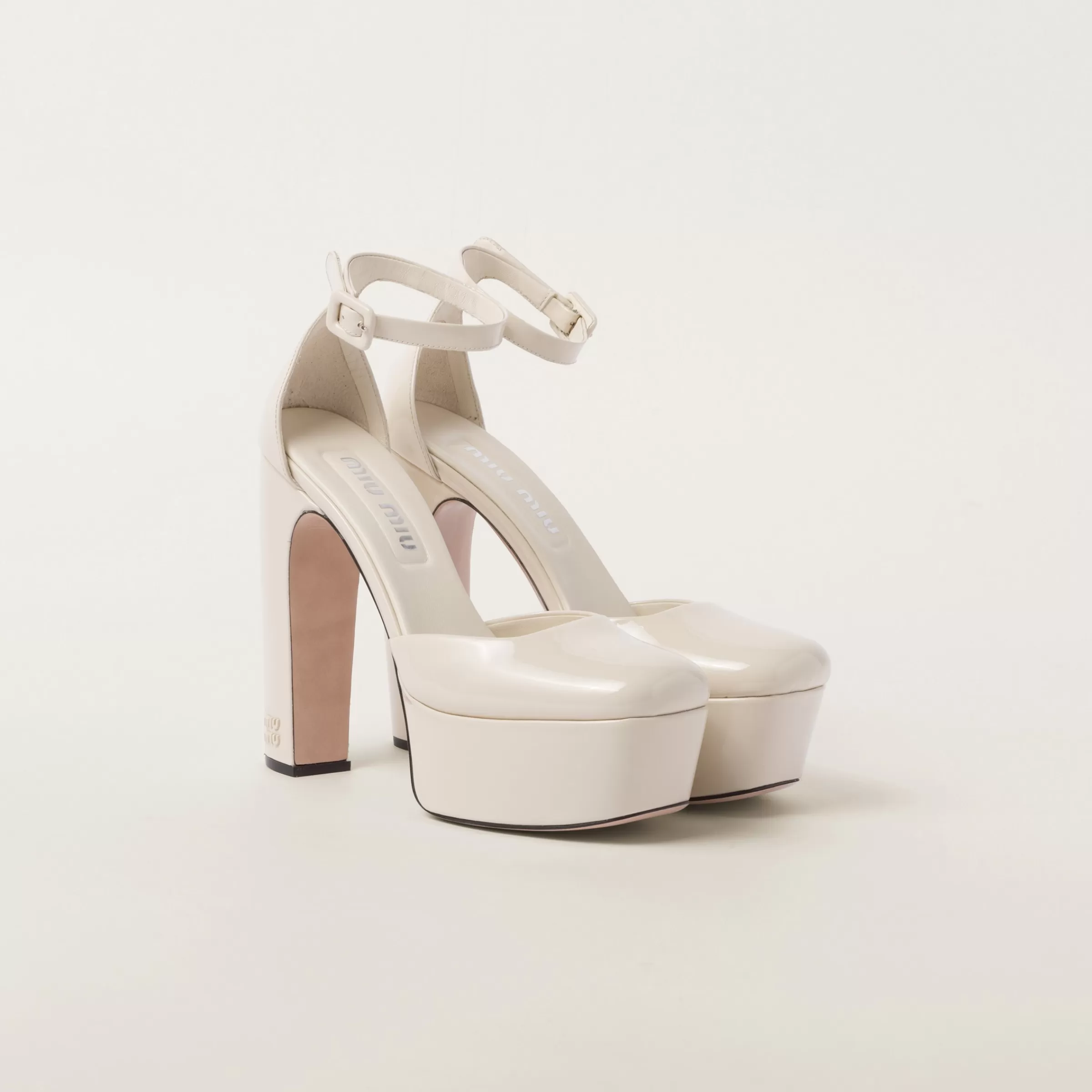 Miu Miu Patent Leather Platform Pumps |
