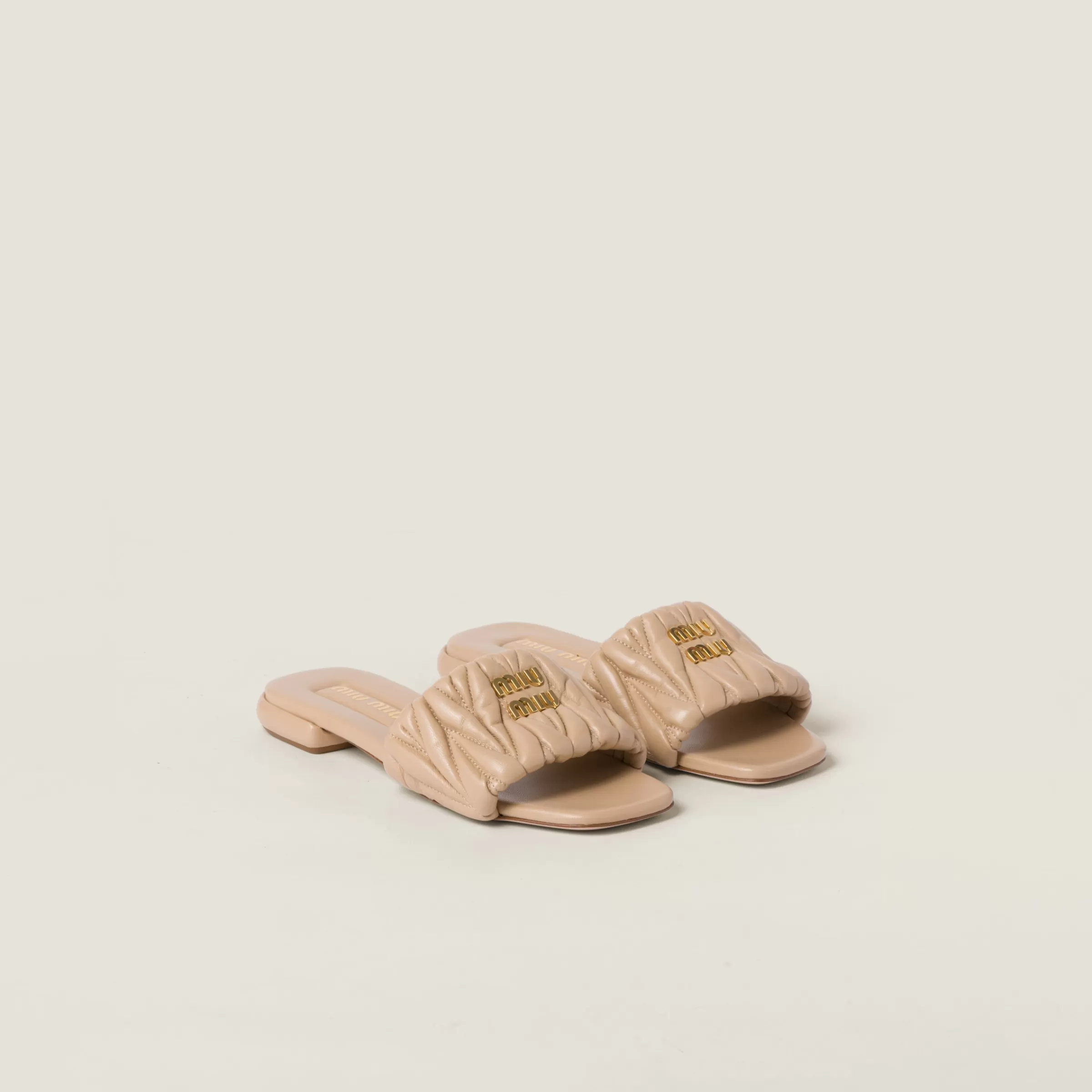 Miu Miu Matelassé Nappa Leather Slides |