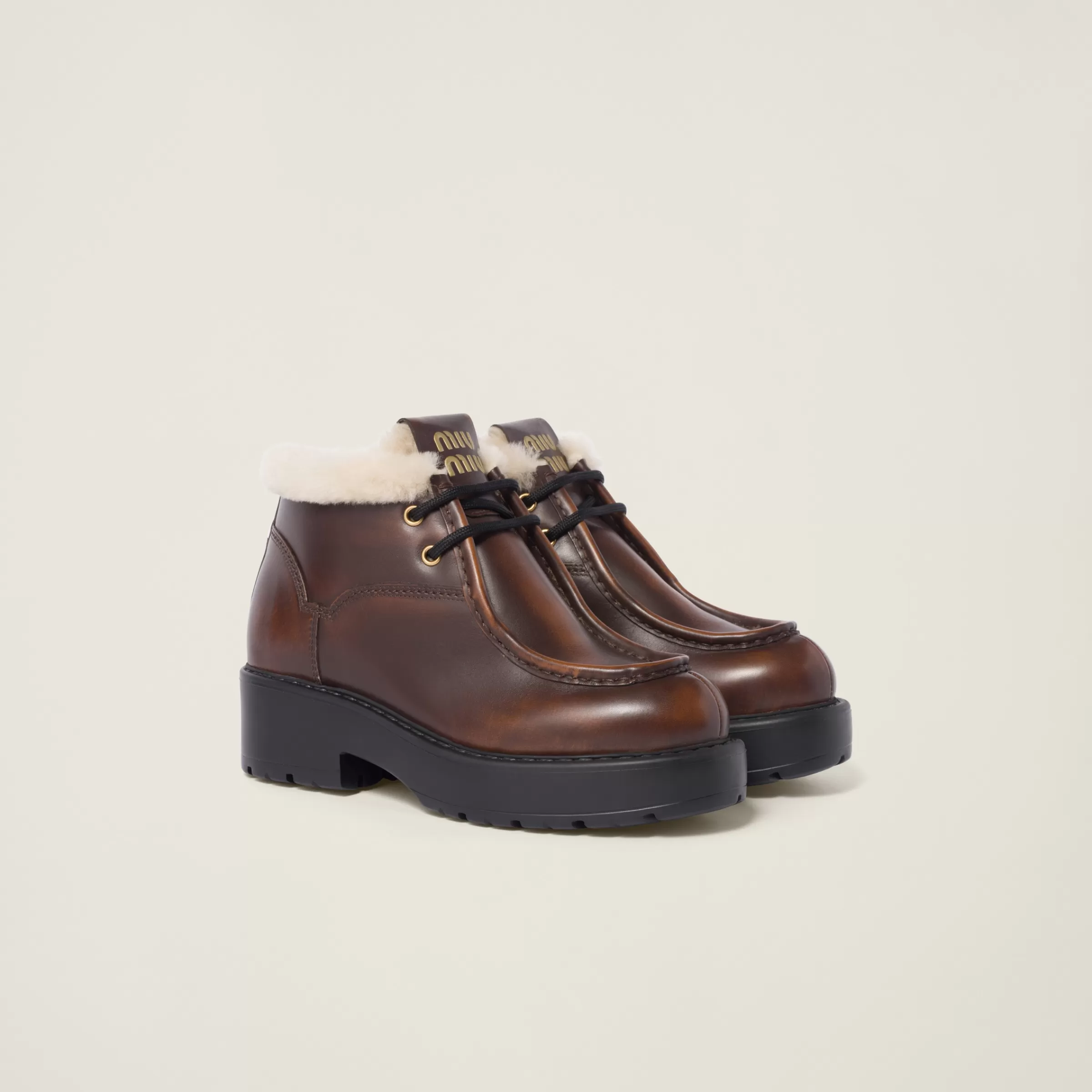 Miu Miu Fumé Leather Booties |