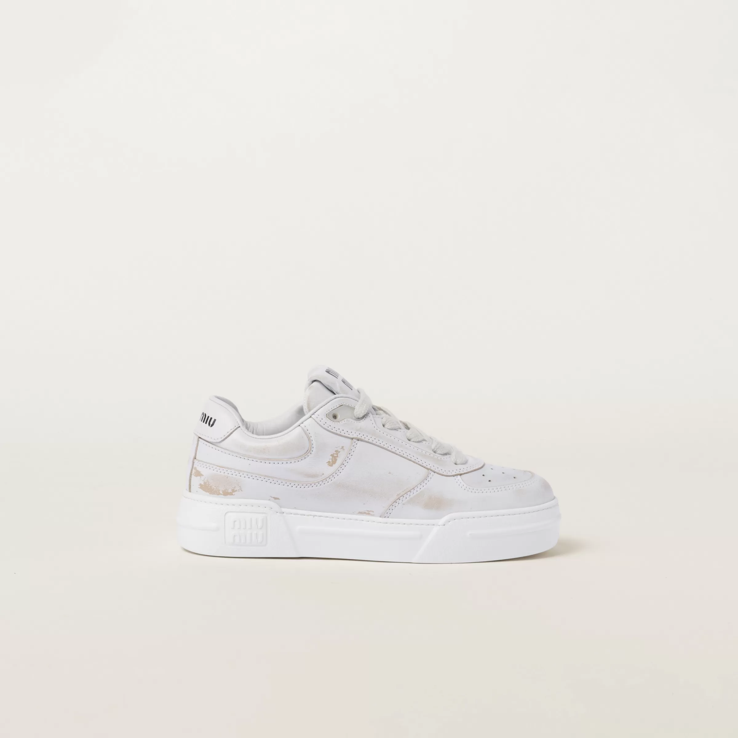 Miu Miu Bleached Leather Sneakers |