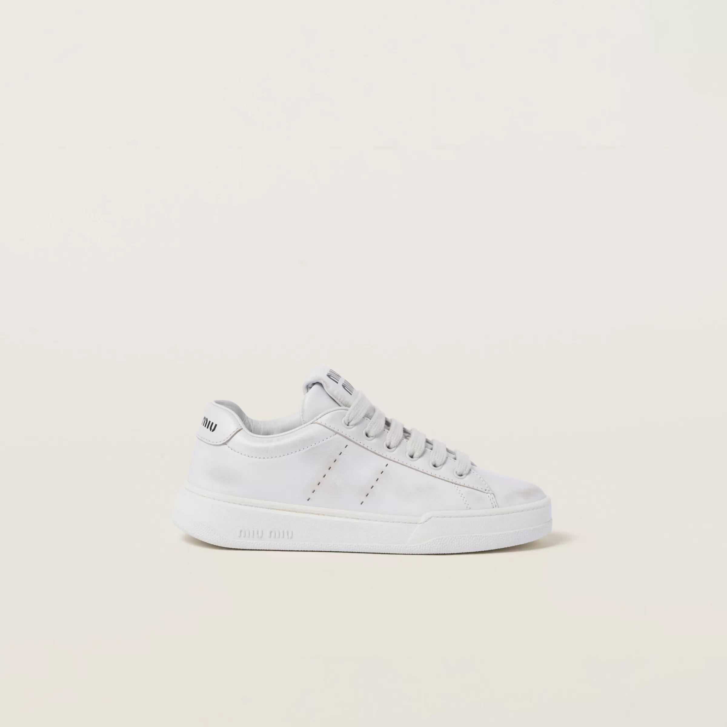 Miu Miu Bleached Leather Sneakers |
