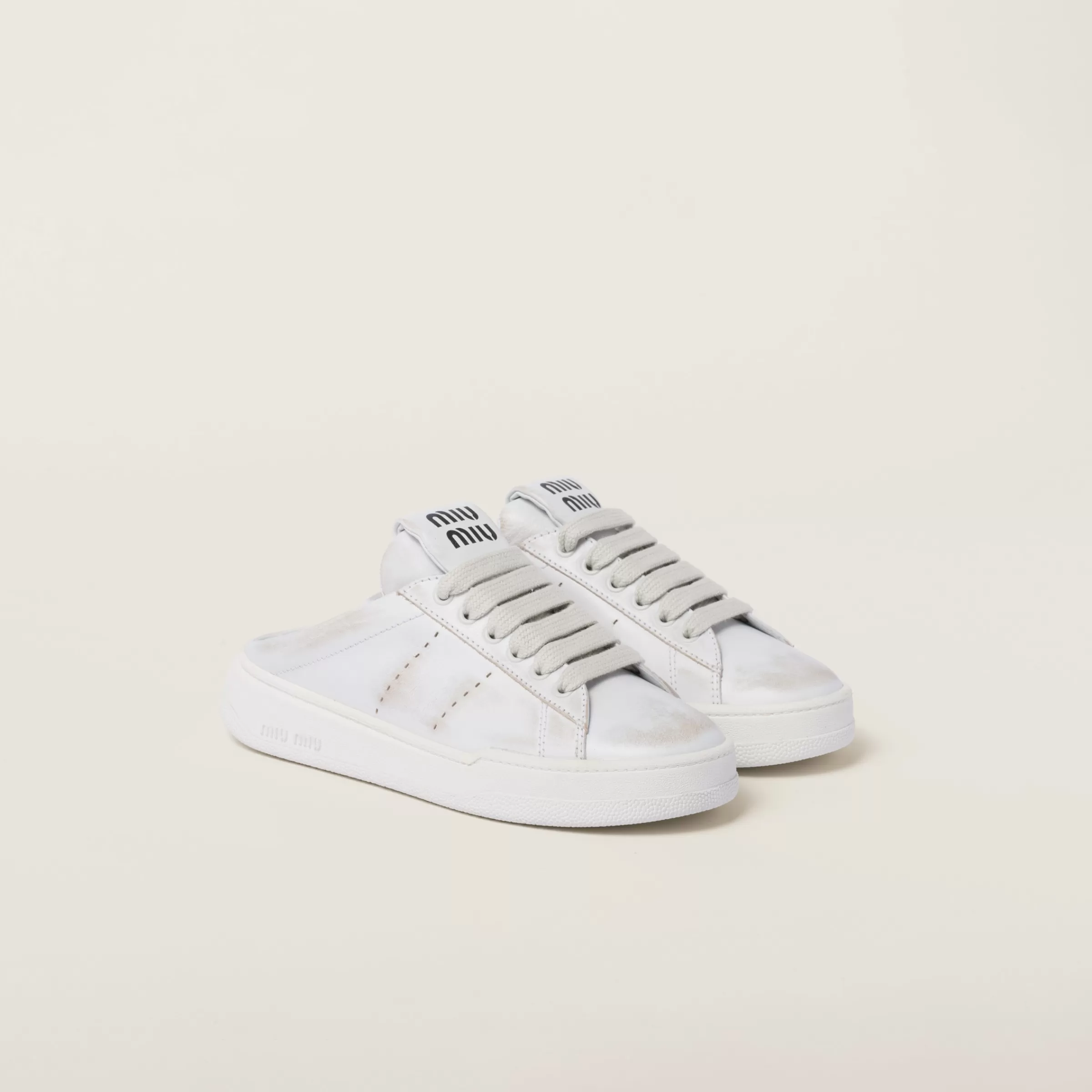 Miu Miu Bleached Leather Sneakers |