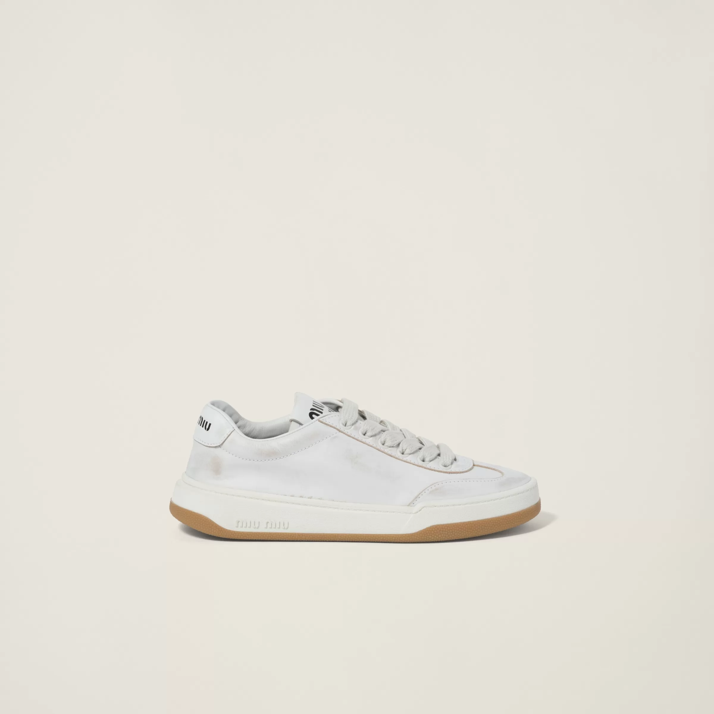 Miu Miu Bleached Leather Sneakers |