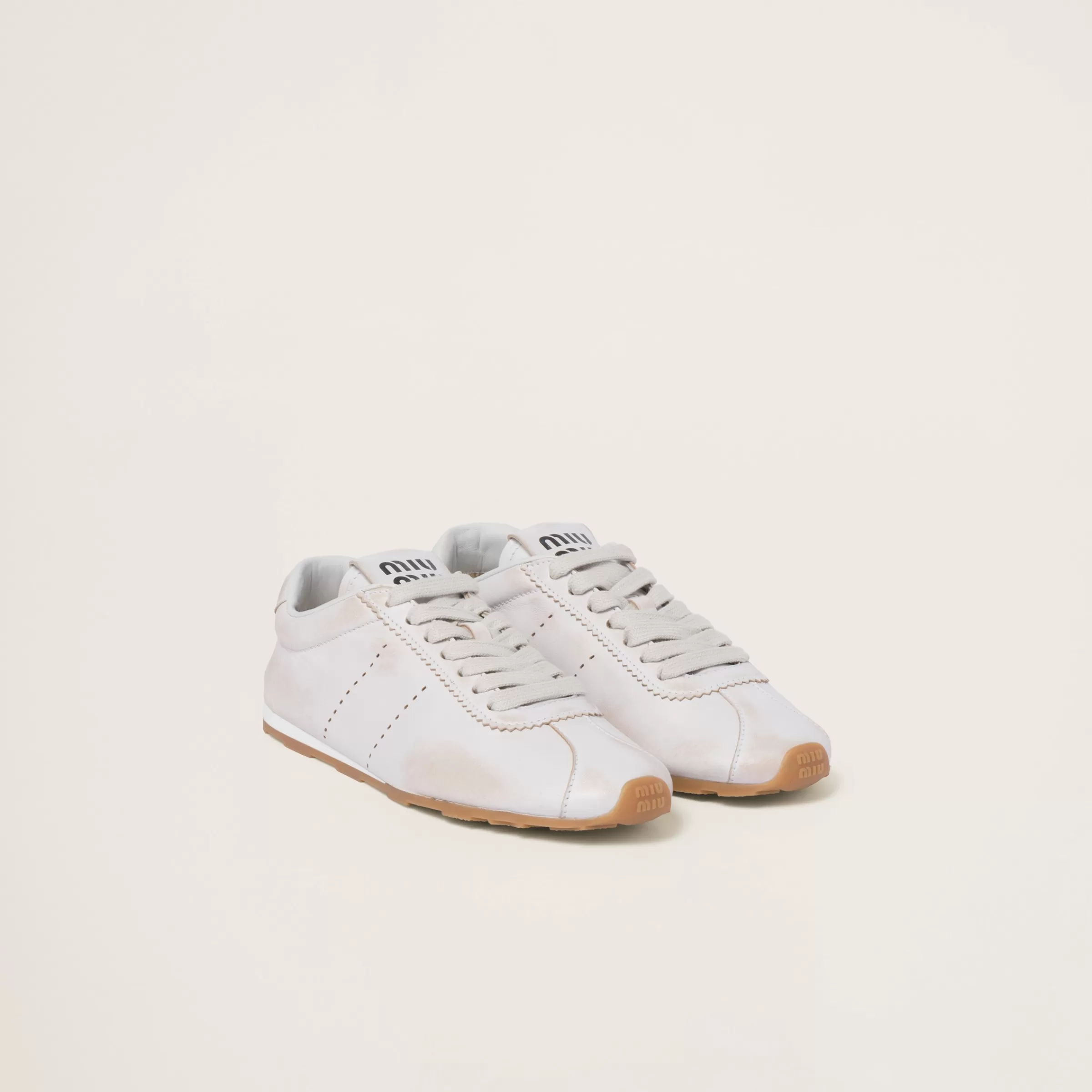 Miu Miu Bleached Nappa Leather Sneakers |