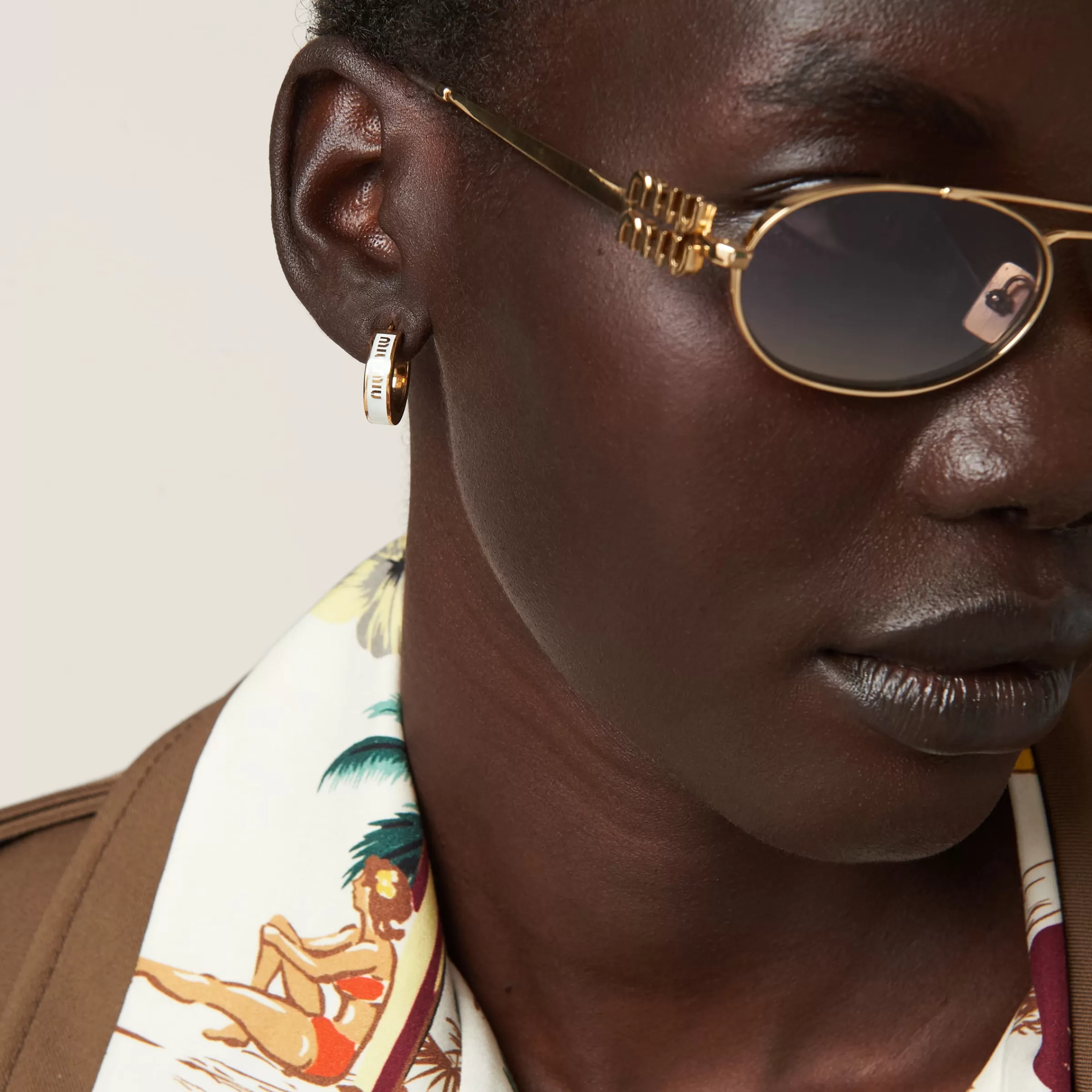 Miu Miu Enameled Metal Earrings |