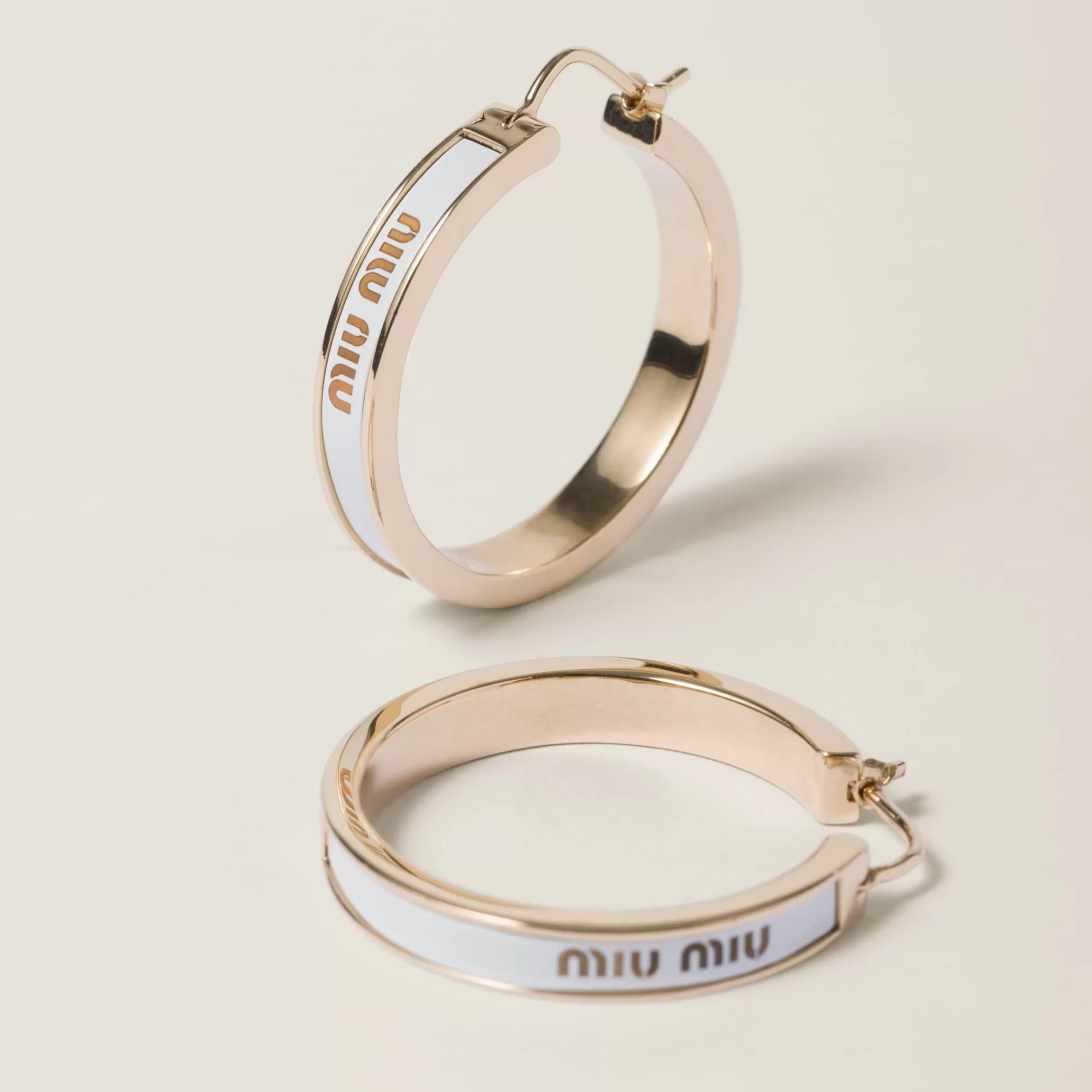 Miu Miu Enameled Metal Earrings |