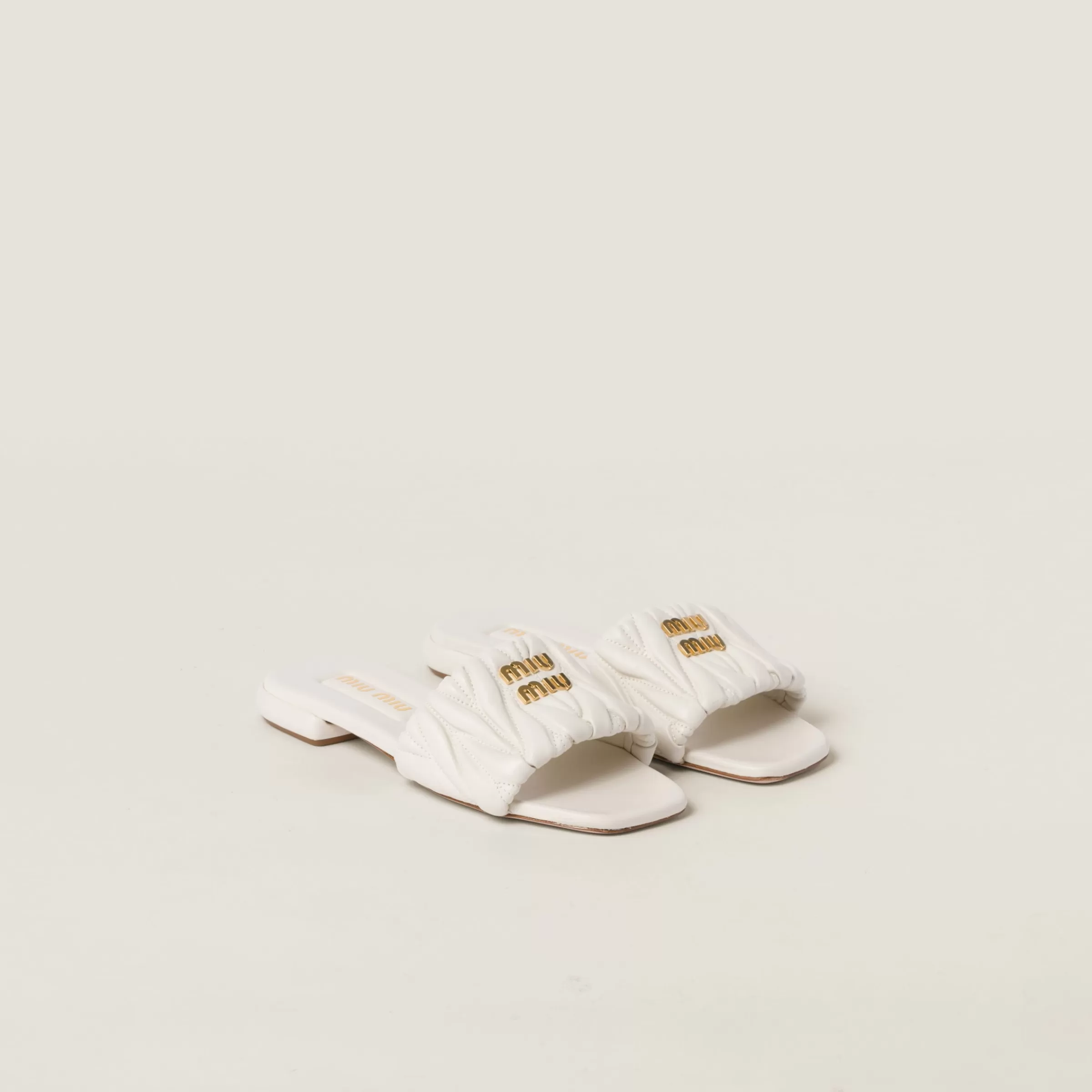 Miu Miu Matelassé Nappa Leather Slides |