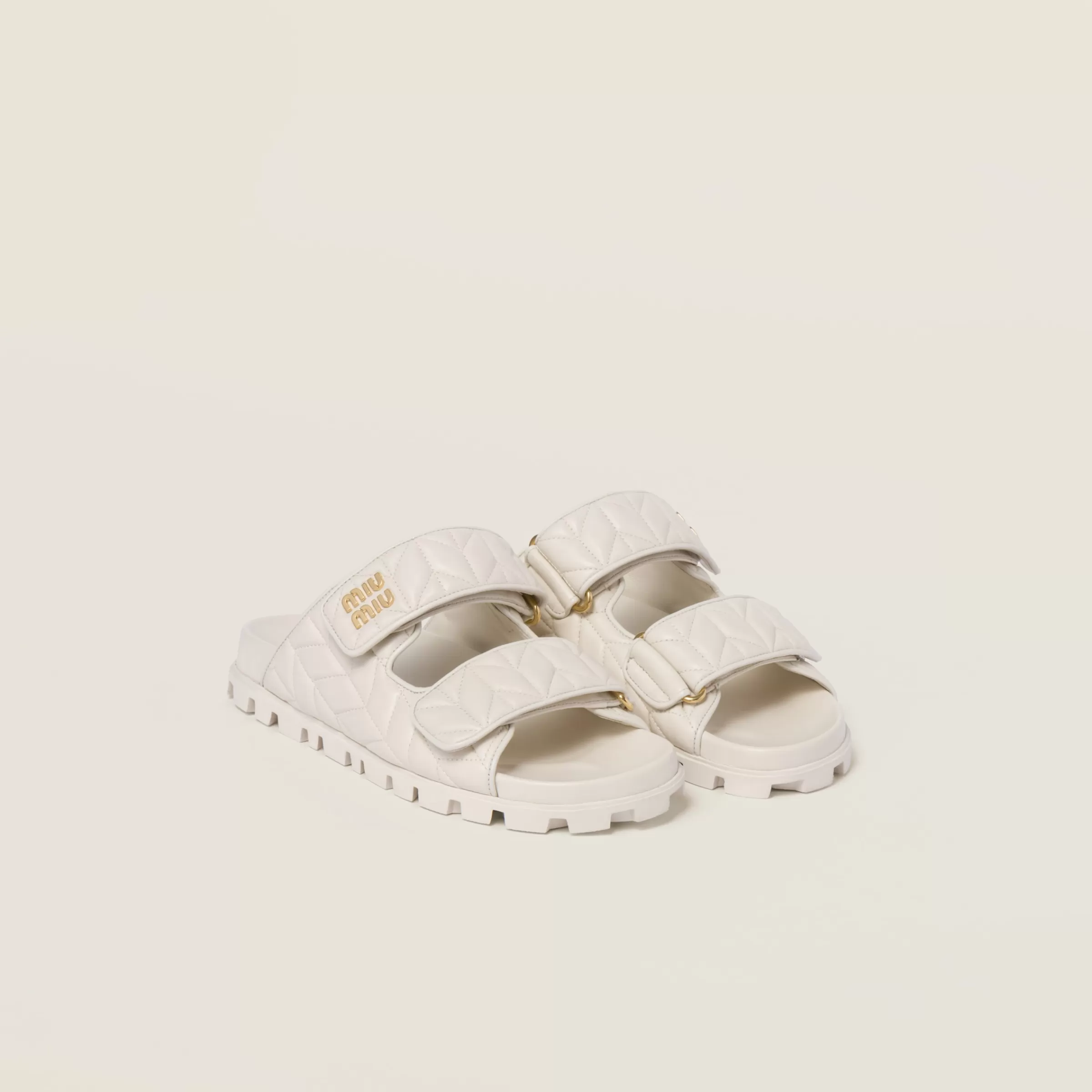 Miu Miu Matelassé Nappa Leather Slides |