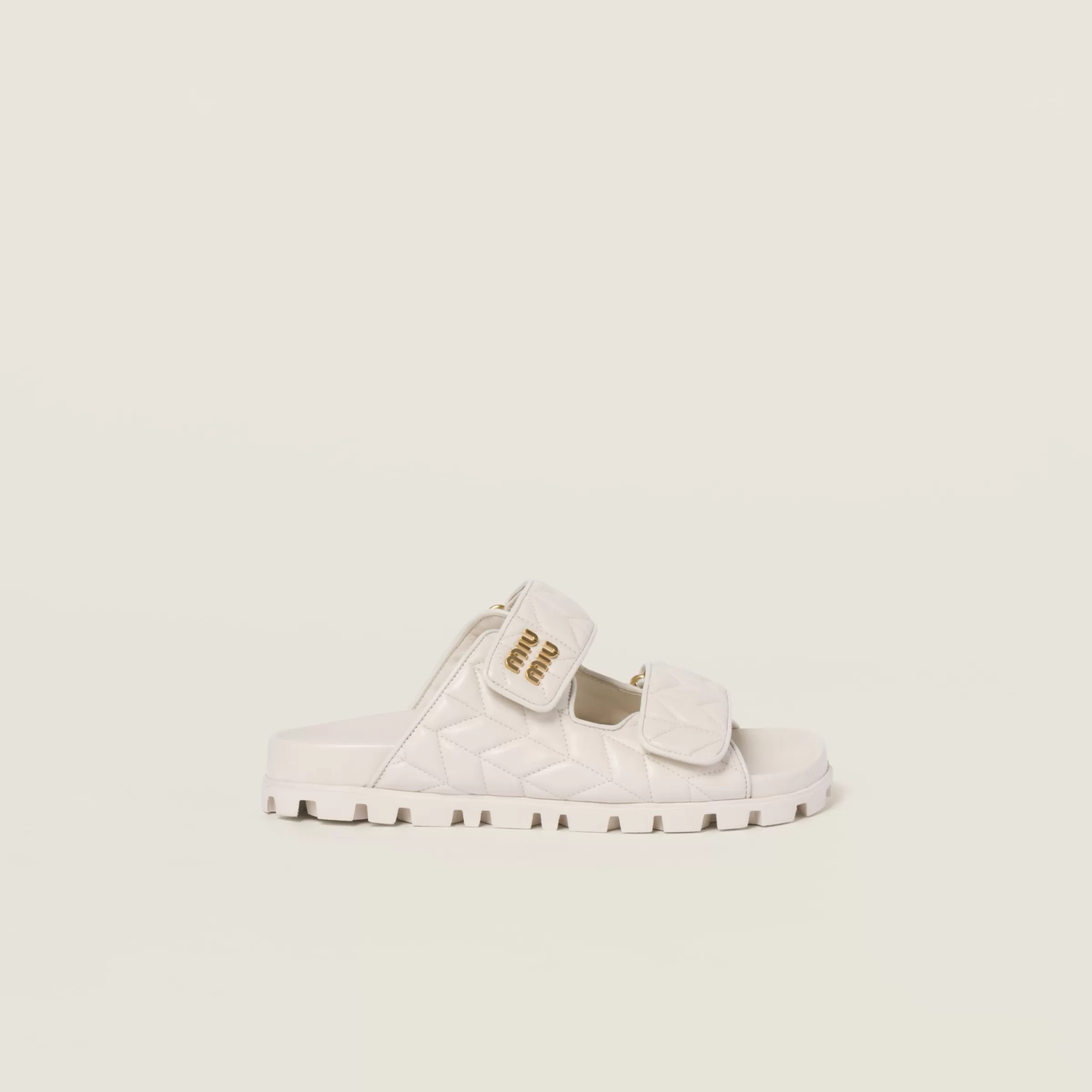 Miu Miu Matelassé Nappa Leather Slides |