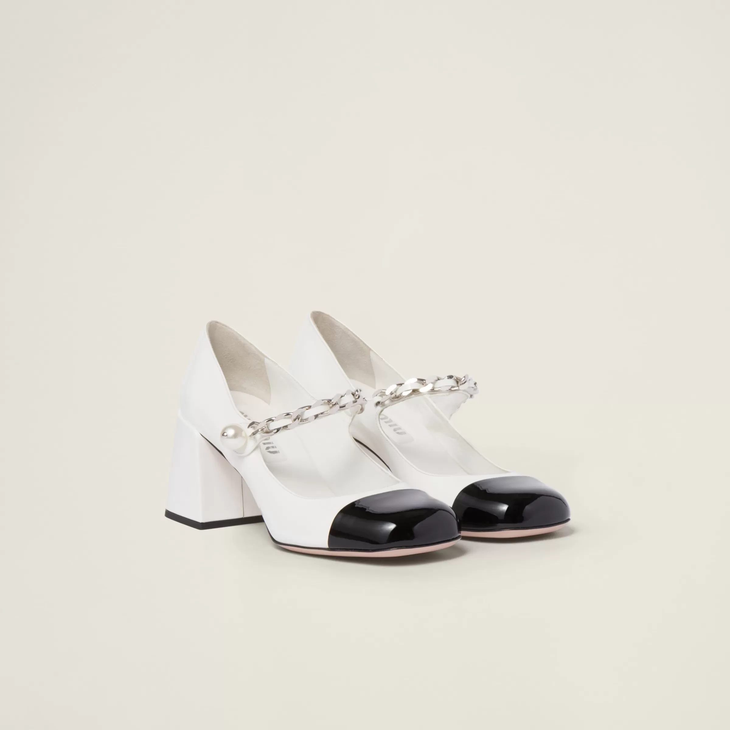 Miu Miu Patent Leather Pumps |