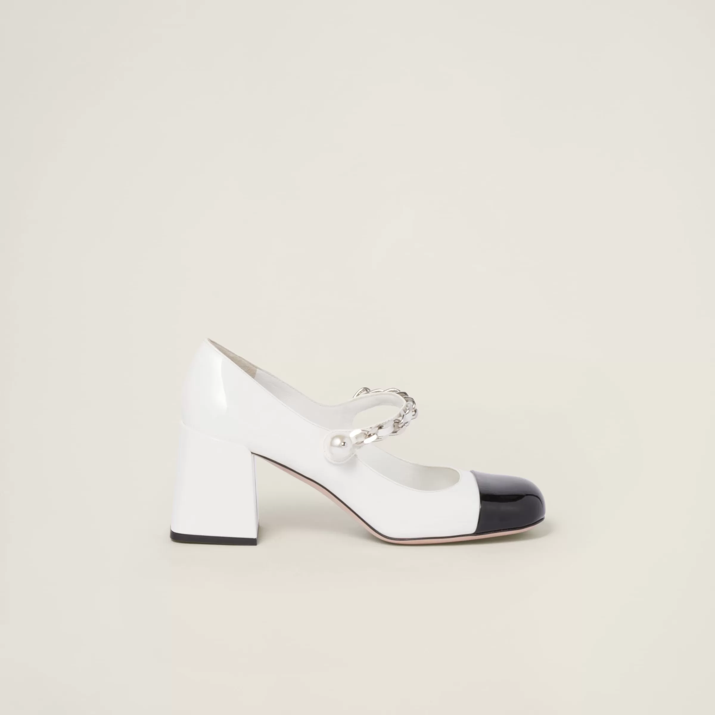 Miu Miu Patent Leather Pumps |